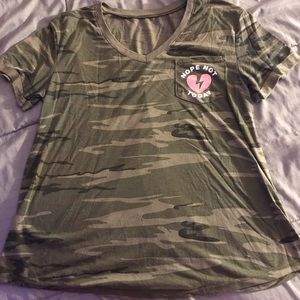 camo t-shirt with heart logo on pocket